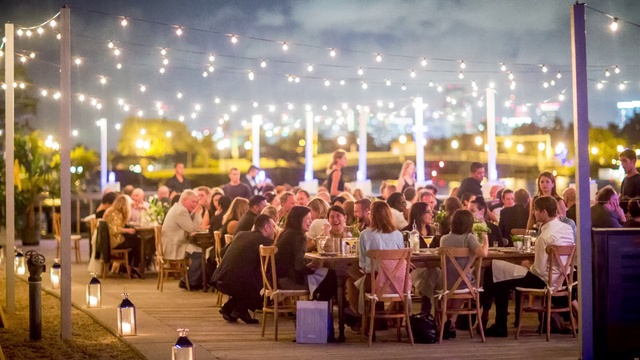 Video Reference: Event, Crowd, Restaurant, Night, Ceremony, Party, Meal, City