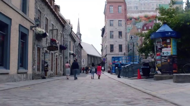 Video Reference: Town, Neighbourhood, Street, Pedestrian, Human settlement, Downtown, City, Road, Building, Thoroughfare