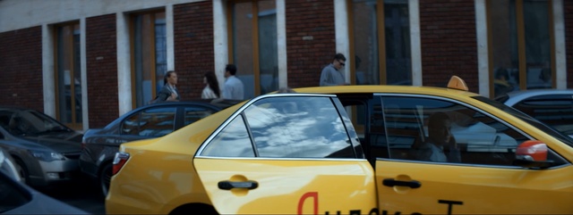 Video Reference: Vehicle door, Vehicle, Car, Yellow, Motor vehicle, Taxi, Mode of transport, Automotive exterior, Mid-size car, Automotive window part