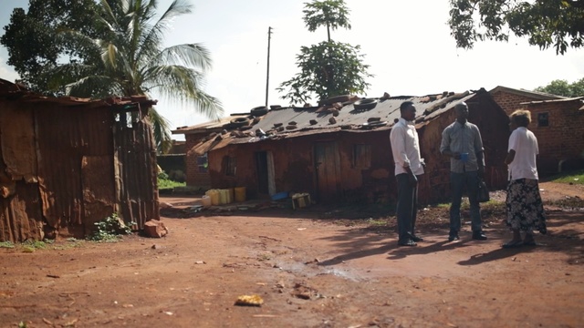 Video Reference: slum, shack, village, residential area, rural area, neighbourhood, hut, house, land lot, tree