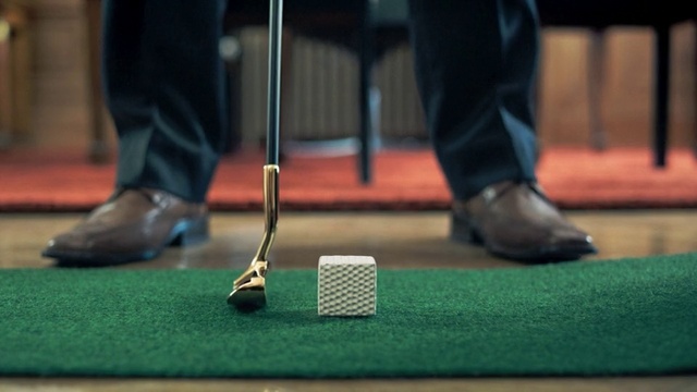 Video Reference: Golf, Putter, Miniature golf, Golf club, Golf equipment, Recreation, Footwear, Golf ball, Shoe, Sports equipment, Person