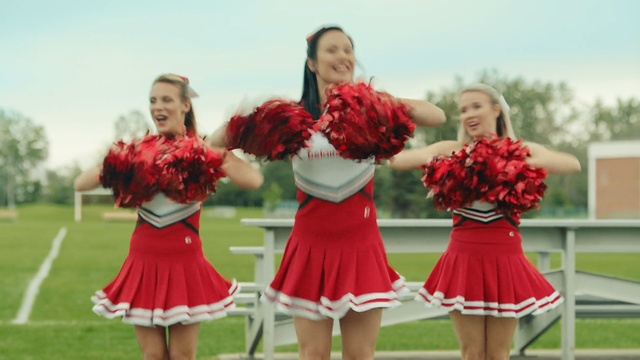 Video Reference: red, cheerleading, flower, cheering, grass, spring, fun, team, bridesmaid, girl, Person