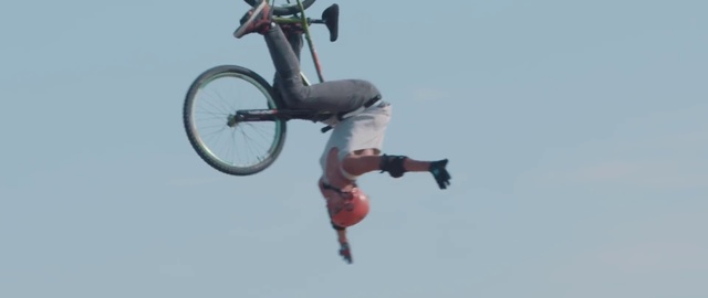 Video Reference: Stunt performer, Stunt, Extreme sport, Freestyle bmx, Bicycle motocross, Vehicle, Jumping, Flip (acrobatic), Cycle sport, Sports