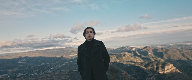 Video Reference: sky, mountainous landforms, cloud, mountain, mountain range, ridge, tree, girl, winter, meteorological phenomenon, Person