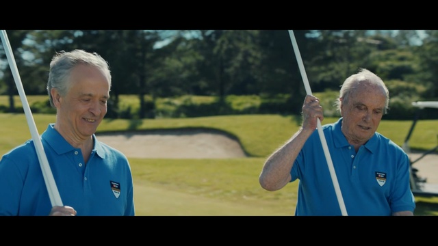 Video Reference: Golf, Recreation, Golf club, Fourball, Golf course, Golf equipment, Photo caption, Competition event, Leisure, Lawn, Person