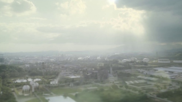 Video Reference: Sky, Aerial photography, Atmospheric phenomenon, Haze, Atmosphere, Cloud, Daytime, Birds-eye view, Urban area, Metropolitan area