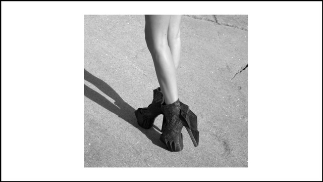 Video Reference: Leg, Footwear, High heels, Snapshot, Black-and-white, Joint, Shoe, Human leg, Ankle, Human body