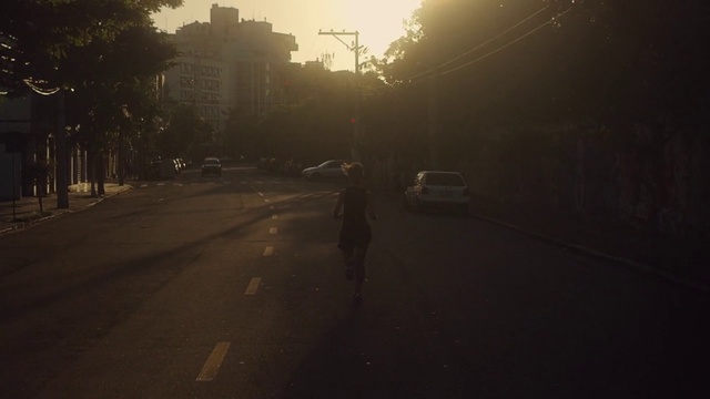 Video Reference: Sky, Atmospheric phenomenon, Morning, Cloud, Light, Atmosphere, Asphalt, Road, Mode of transport, Urban area, Person