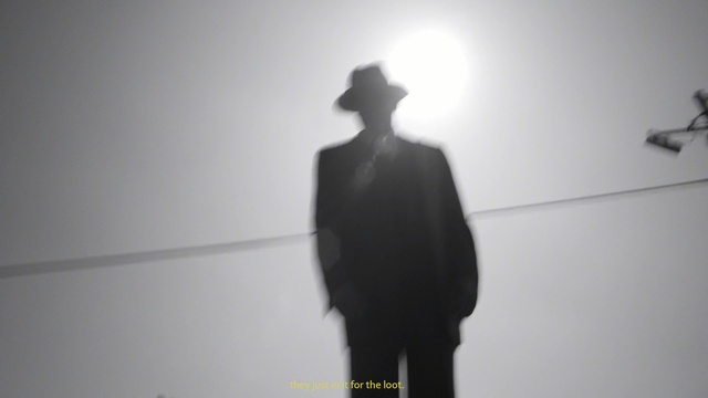 Video Reference: black and white, standing, silhouette, monochrome photography, shadow, shoulder, gentleman, monochrome, darkness, Person