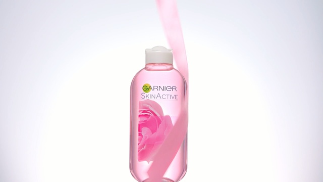 Video Reference: product, product, liquid, spray, lotion, Person