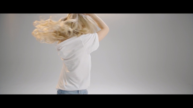 Video Reference: hair, photograph, human hair color, shoulder, standing, neck, girl, joint, blond, arm