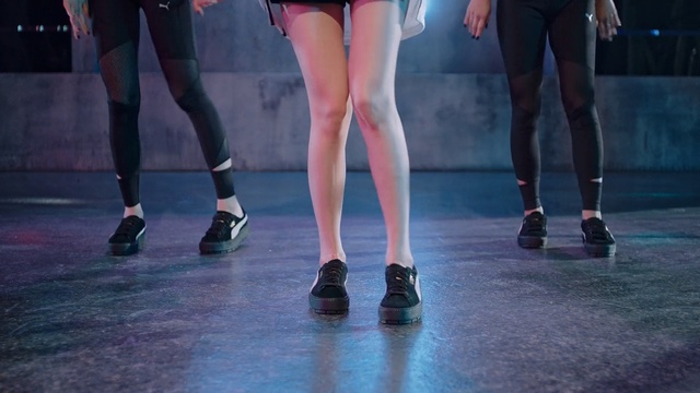 Video Reference: footwear, shoe, performance, leg, fashion model, performing arts, joint, fashion, entertainment, human leg, Person