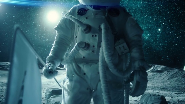 Video Reference: Electric blue, Entertainment, Cg artwork, Space, Fictional character, Event, Performing arts, Darkness, Personal protective equipment, Machine