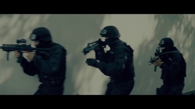 Video Reference: Gun, Firearm, Swat, Airsoft, Airsoft gun, Personal protective equipment, Shooter game, Shooting, Soldier, Recreation, Thing, Photo, Man, Looking, Front, Holding, Standing, Mirror, Dark, Wearing, Group, Table, Playing, Woman, Yellow, Reflection, Room, People, Riding, Display, Train, White, Screenshot, Weapon, War, Video game, Rifle, Clothing, Person, Image