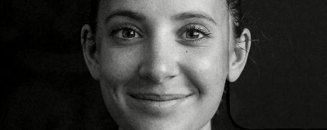 Video Reference: Face, Eyebrow, Forehead, Nose, Facial expression, Cheek, Head, Skin, Chin, Close-up, Person, Necktie, Man, Wearing, Indoor, Posing, Photo, Black, Camera, Looking, Smiling, Hair, Suit, Dress, Young, Glasses, Dark, White, Standing, Bow, Shirt, Neck, Close, Eyes, Hat, Woman, Holding, Red, Human face, Smile, Portrait, Staring, Male