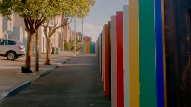 Video Reference: Blue, Yellow, Red, Light, Wall, Tree, Daytime, Line, Public space, Urban area