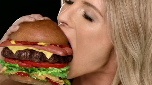 Video Reference: fast food, hamburger, junk food, food, sandwich, mouth, cheeseburger, eating, whopper, finger food, eating