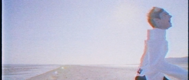 Video Reference: sea, sky, vacation, horizon, summer, ocean, calm, girl, sand, landscape