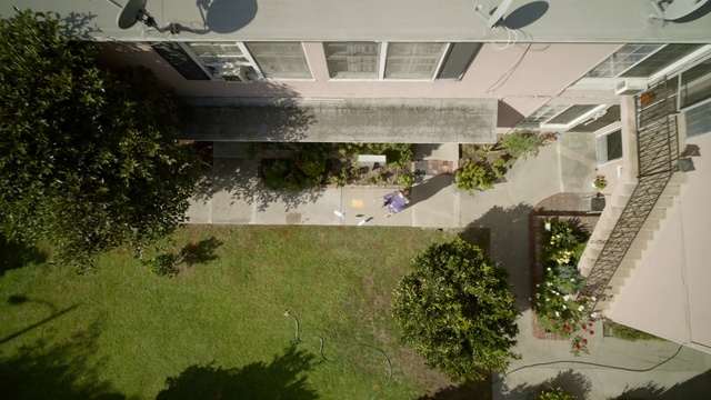 Video Reference: Residential area, Property, Urban design, Architecture, Suburb, Real estate, Landscape, Tree, House, Home