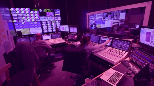 Video Reference: Recording studio, Purple, Room, Broadcasting, Interior design, Building, Furniture, Electronic device, Studio, Television studio