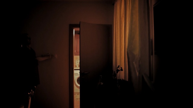 Video Reference: black, darkness, light, lighting, light fixture, lamp, night, wood, window, midnight, Person