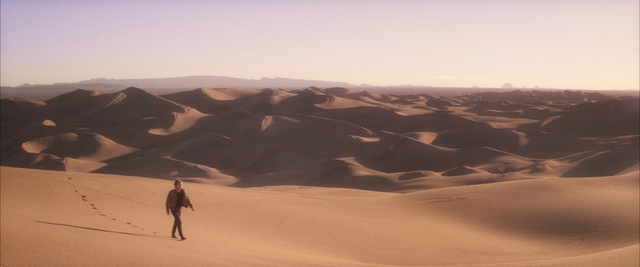 Video Reference: dune, sand, landscape, desert, soil, mountain, sky, mountains, travel, earth, Person