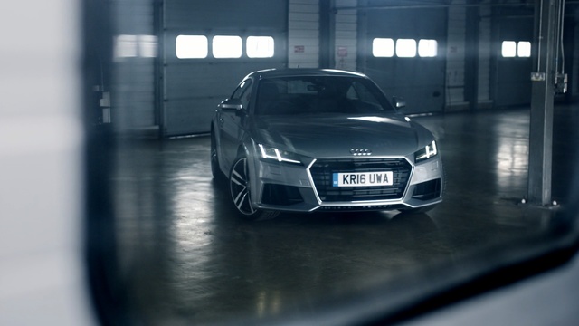 Video Reference: car, land vehicle, motor vehicle, blue, vehicle, white, automotive design, family car, audi, wheel, Person