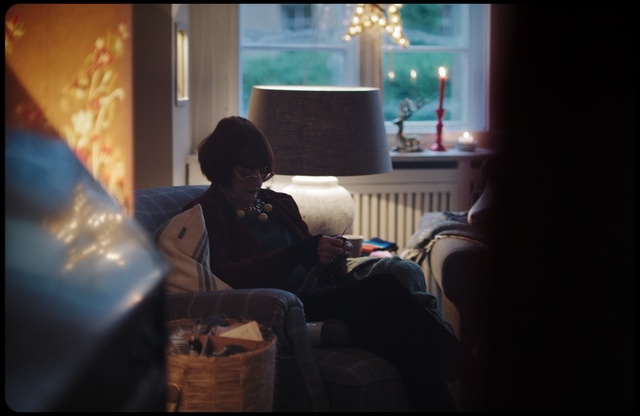 Video Reference: blue, darkness, light, snapshot, sitting, night, lighting, fun, girl, sunlight, Person