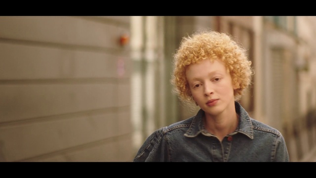 Video Reference: Hair, Face, Hairstyle, Head, Nose, Cheek, Chin, Snapshot, Blond, Human, Person