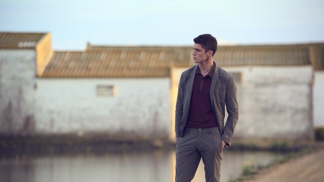 Video Reference: Photograph, Standing, Male, Fashion, Wall, Photography, Gentleman, Suit, Outerwear, Street fashion, Person