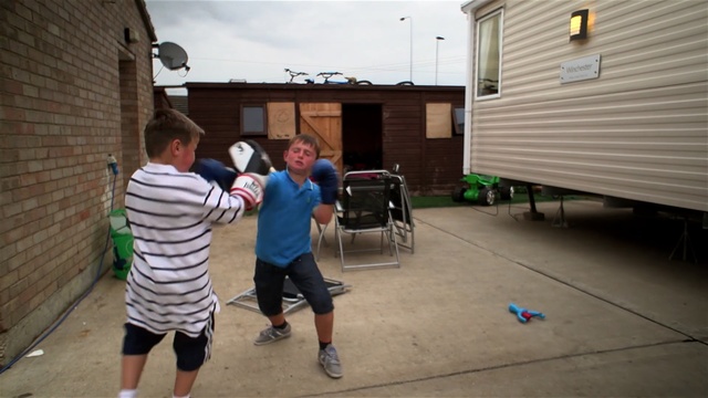 Video Reference: day, community, house, recreation, fun, sports, competition event, race, roof, vacation