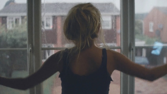 Video Reference: Hair, Shoulder, Photograph, Hairstyle, Blond, Window, Arm, Snapshot, Joint, Standing