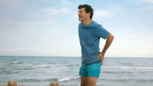 Video Reference: T-shirt, Vacation, Standing, Ocean, Summer, Fun, Sea, Shorts, Neck, Leisure, Person
