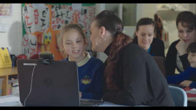 Video Reference: room, education, technology, electronic device, learning, student, girl, fun, communication, Person