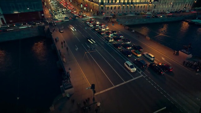 Video Reference: Metropolitan area, Sky, Urban area, Night, City, Traffic, Road, Infrastructure, Mode of transport, Evening