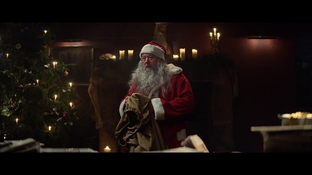 Video Reference: Santa claus, Christmas, Facial hair, Beard, Holiday, Fictional character, Christmas eve, Event, Tradition, Christmas lights, Person
