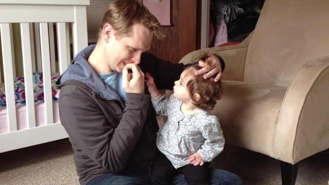 Video Reference: people, child, toddler, product, girl, family, ear, fun, daughter, father