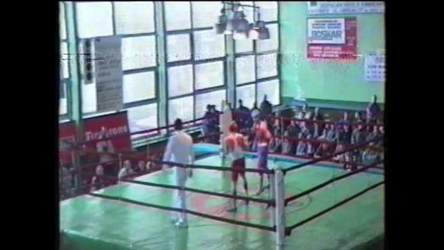 Video Reference: Sports, Sport venue, Boxing ring, Individual sports, Room, Sports equipment, Boxing equipment, Net, Display device, Contact sport