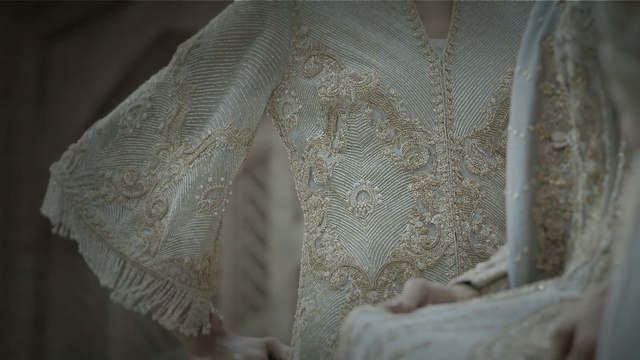 Video Reference: bridal clothing, dress, lace, wedding dress, outerwear, bridal accessory, gown, textile, embellishment, silk