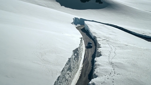 Video Reference: nunatak, ridge, geological phenomenon, glacial landform, arête, ice, snow, ice cap, arctic, glacier, Person