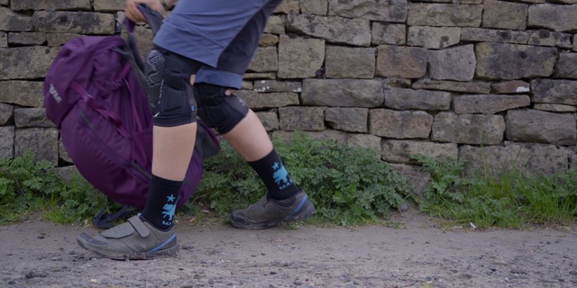 Video Reference: Footwear, Leg, Shoe, Joint, Sock, Knee, Boot, Human leg, Thigh, Jeans