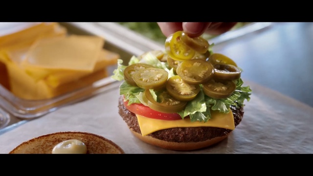 Video Reference: Dish, Food, Cuisine, Junk food, Ingredient, Hamburger, Fast food, Finger food, Cheeseburger, Produce, Person, Female