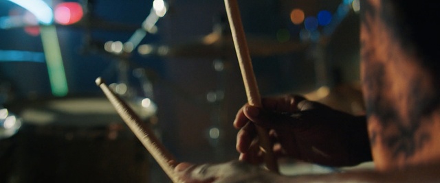 Video Reference: human body, music, string instrument, musical instrument accessory, hand, audio, darkness, performance, musical instrument, event