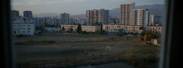 Video Reference: Residential area, Metropolitan area, Sky, Urban area, City, Suburb, Skyline, Condominium, Downtown, Tower block, Person