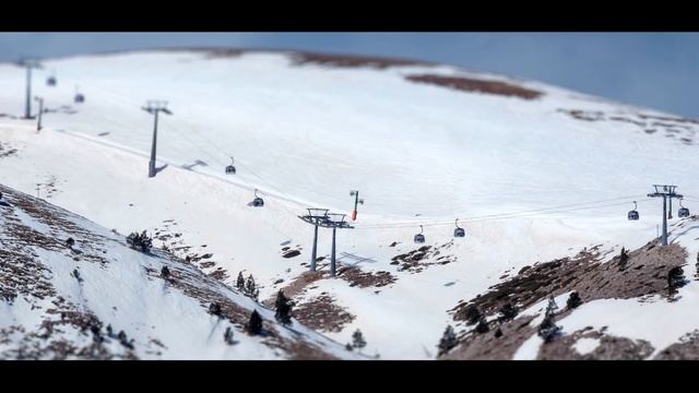 Video Reference: snow, sky, mountainous landforms, winter, geological phenomenon, piste, mountain range, mountain, cloud, winter sport