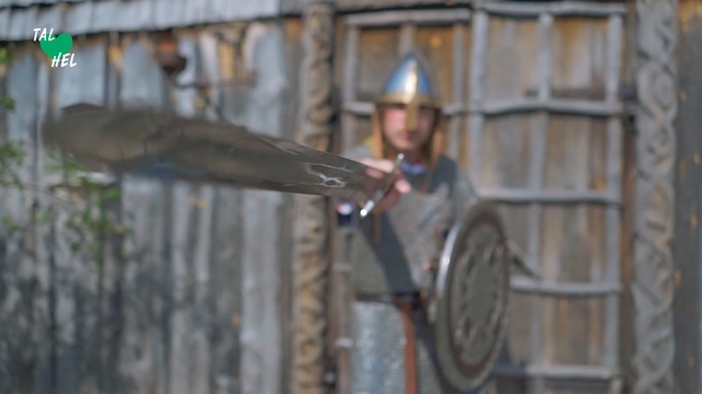 Video Reference: Wall, Brickwork, Metal, Person, Building, Outdoor, Street, Woman, Man, Bicycle, Riding, Young, Standing, Holding, City, Bird, Jumping, Doing, Umbrella, White, Helmet, Clothing