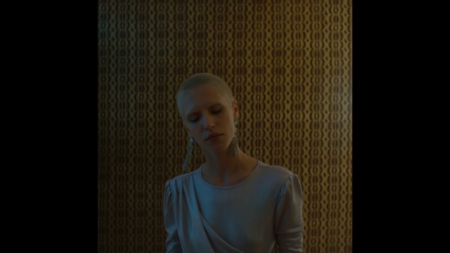 Video Reference: blue, photograph, nose, head, portrait, snapshot, screenshot, darkness, photography, chin, Person