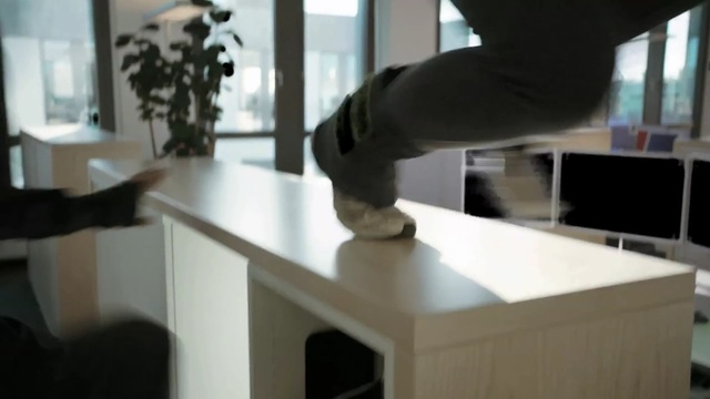 Video Reference: furniture, desk, table, office, interior design, angle, Person