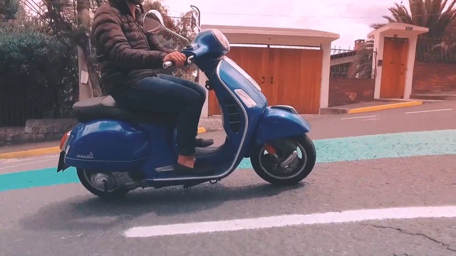 Video Reference: Land vehicle, Scooter, Vehicle, Motor vehicle, Mode of transport, Vespa, Car, Automotive design, Automotive wheel system, Rim