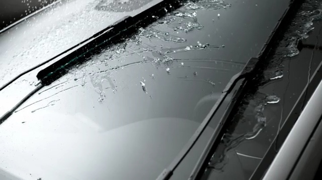 Video Reference: Windshield, Windscreen wiper, Glass, Auto part, Vehicle door, Automotive exterior, Automotive window part, Water, Window, Hood, Person